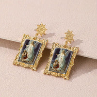 Gold-Plated Alloy Fan Art - Lindberg (aka H. Zabateri) "Guardian Angel Watching Over Children On Bridge" Painting Post Earrings