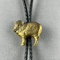 Heliotrope-Spring Winders-Local Artist Bolo Tie: Brass Javelina